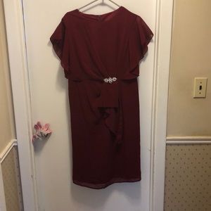 Burgundy dress with jewelled detail at the waist